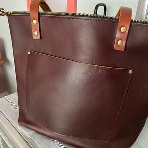 Portland Leather Tote in Deep Brown with tan straps. Zippered